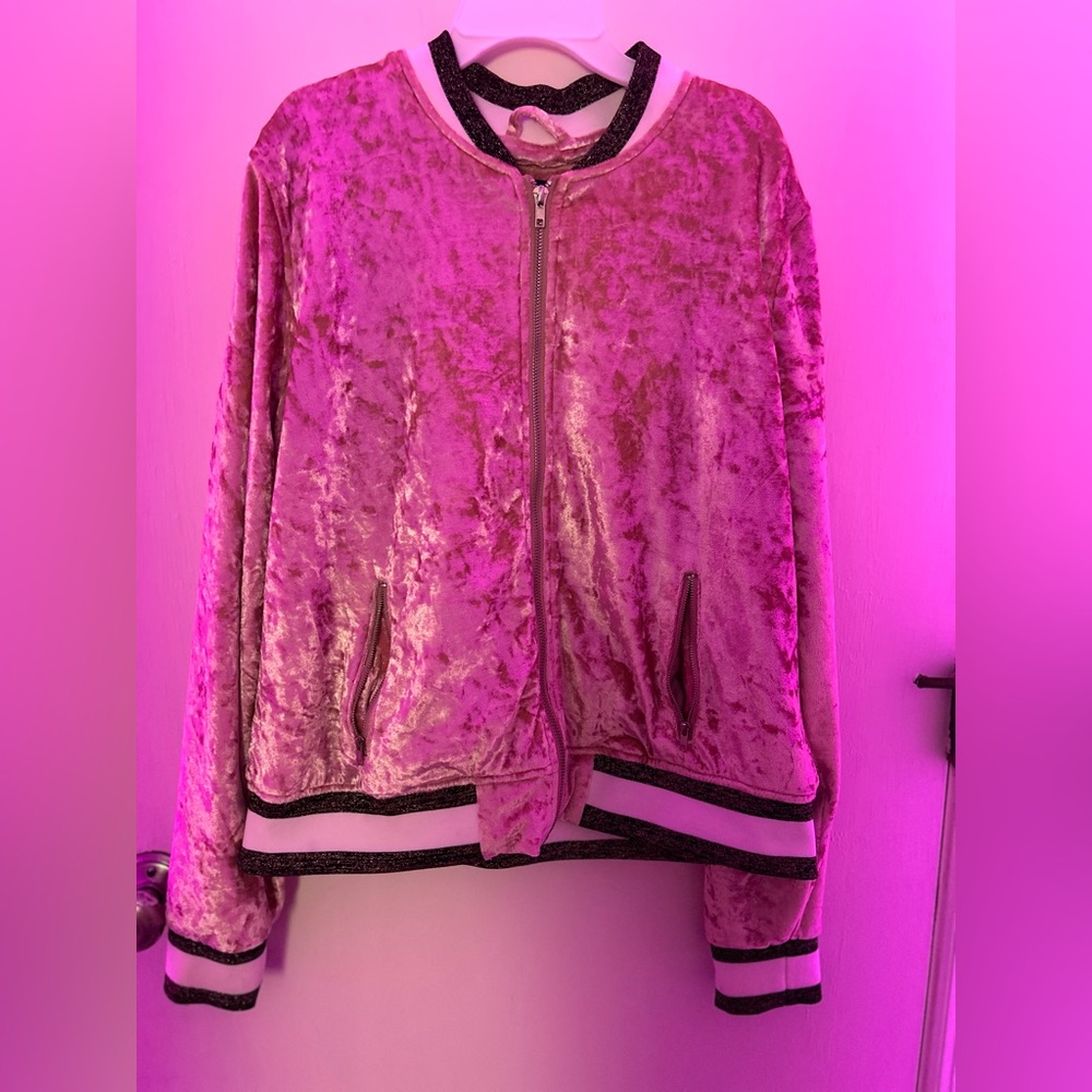 I’m selling a pink velvet sparkly jacket size large from rue 21.